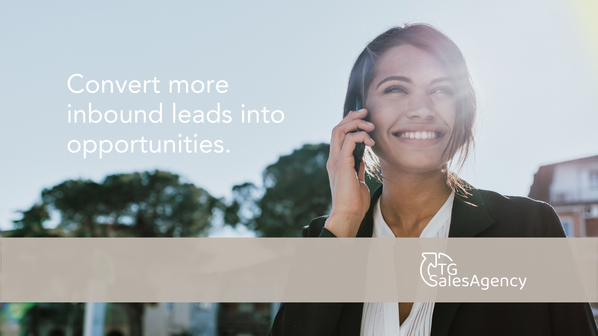 A smiling business professional speaks on the phone outdoors with sunlight behind her. Text on the image reads ‘Convert more inbound leads into opportunities.’ TG Sales Agency logo appears at the bottom.